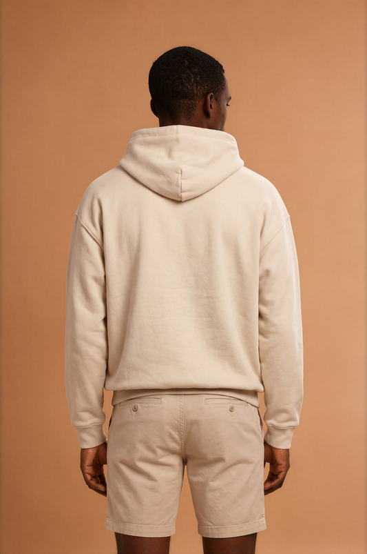Man wearing a sand Powerful Mind Club Brights hoodie,  back view