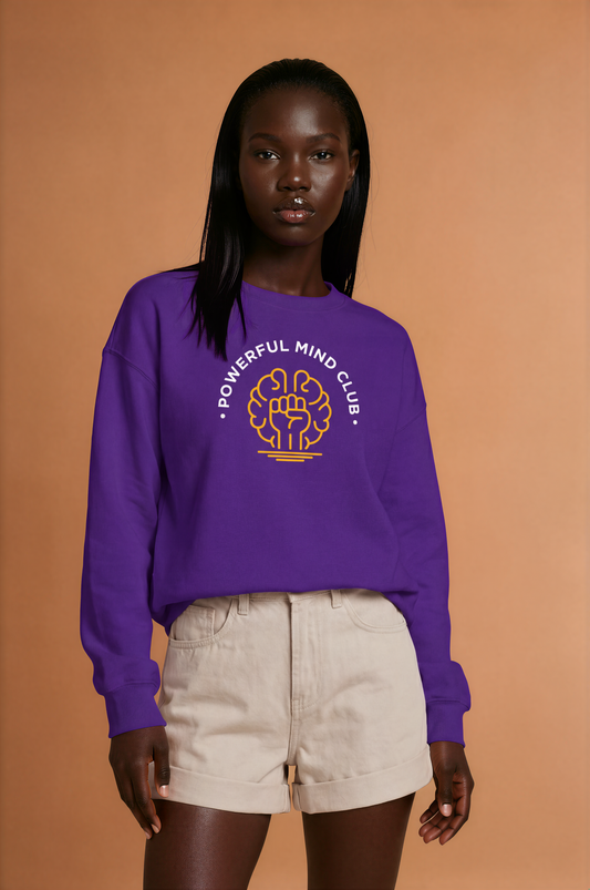 Woman wearing a purple Powerful Mind Club crewneck sweatshirt, front view