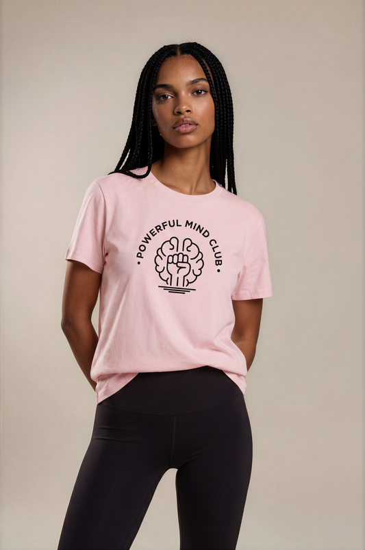 Woman wearing a pink Powerful Mind Club unisex organic t-shirt, front view