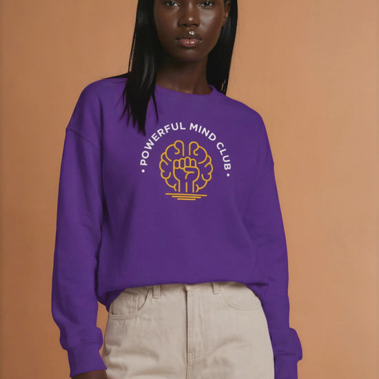 Woman wearing a purple Powerful Mind Club crewneck sweatshirt, video