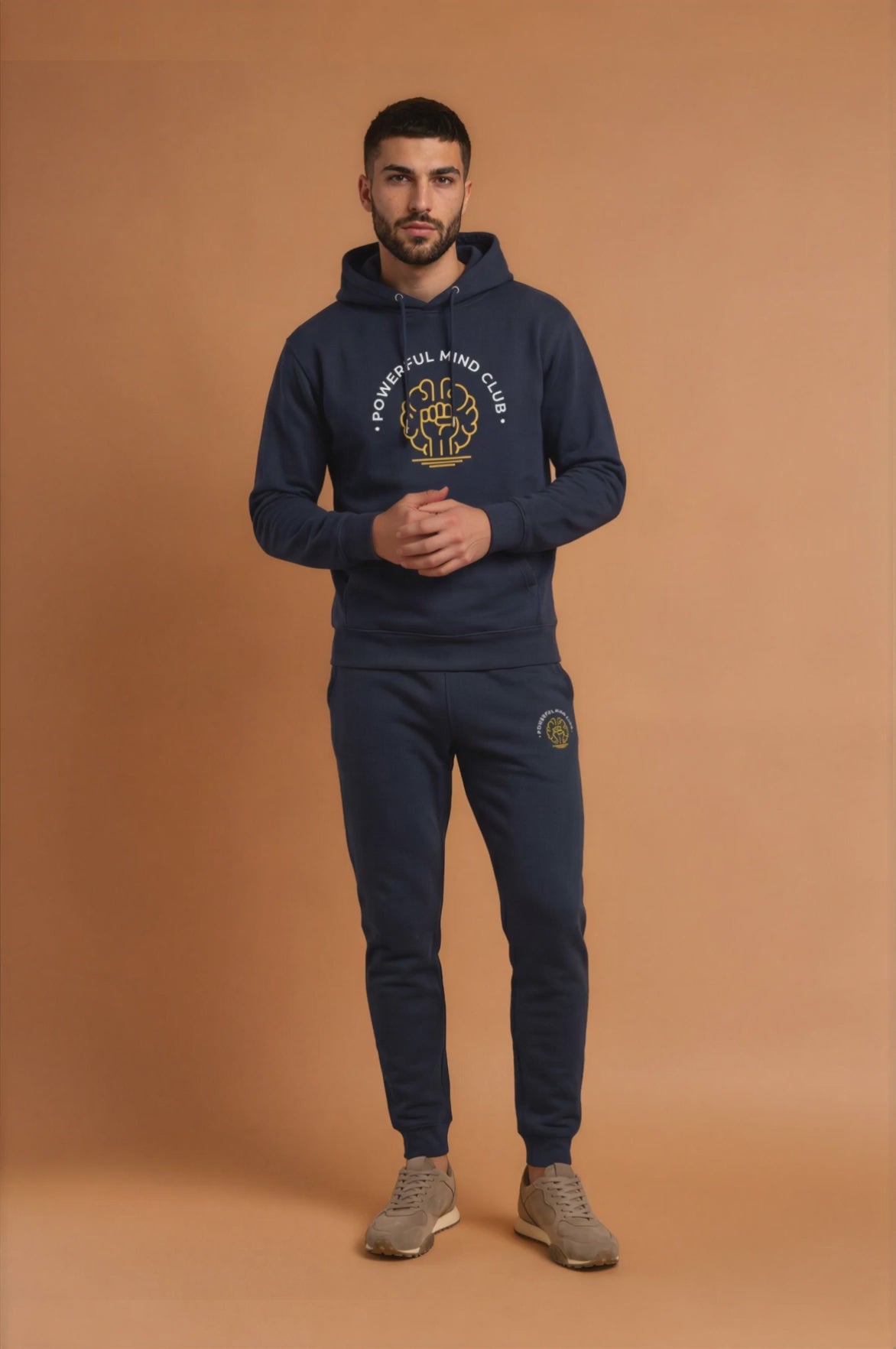 Man wearing navy blazer Powerful Mind Club joggers, video